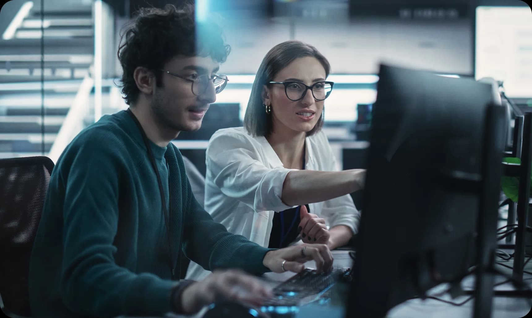 Digital specialists collaborating in an office